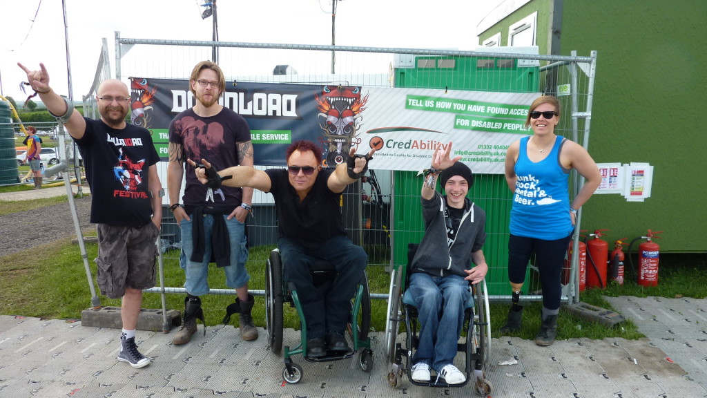 Five leg amputees and wheelchair users enjoying Download Festival: Martin Austin, Joe Bestwick, Mik Scarlett, Joe Brummitt, Jude Hamer.